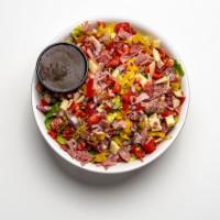 Italian Chopped Salad · Organic romaine, Genoa salami, ham, pepperoni, provolone, banana pepper, red onion, Roma tom...