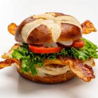 It's So Gouda Burger · Smoked Gouda, applewood smoked bacon, horseradish aioli, lettuce, tomato, red onion, pickle ...