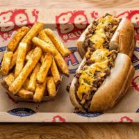 Philly Cheesesteak Sandwich · Shaved steak or chicken, Cheez Whiz or white cheese sauce, caramelized onion, hoagie roll. S...