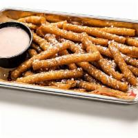 Funnel Cake Fries · Fry-shaped funnel cakes, powdered sugar, cinnamon sauce.