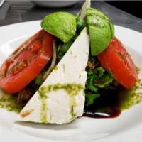 Feta Caprese Salad · pesto, feta, avocado, vine ripe tomatoes and balsamic glaze.