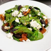 Gibraltar Organic Spinach Salad · Spinach Leaves, Goat Cheese, Candied Walnuts, Sun Dried Figs, Balsamic Vinaigrette