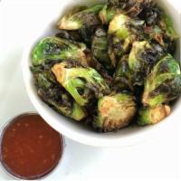 Crispy Brussels Sprouts · Sweet chili glaze on the side. (glaze not vegan)