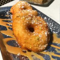 Thai Donuts · 4 Thai Donuts with Pistachio dust and Condensed Milk Dipping Sauce