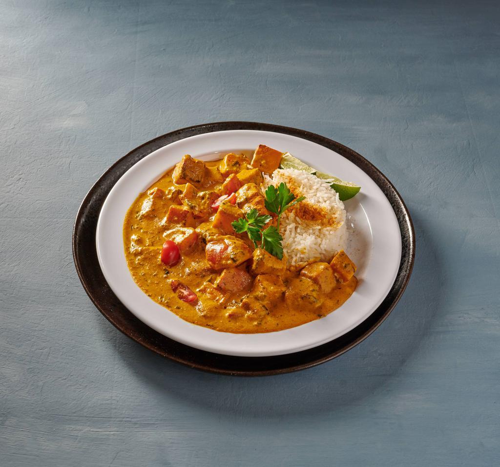 Tikka Masala Specialty · Is first grilled and then simmered in rich yogurt, tomato, coriander and Fenugreek sauce. Probably the most widely eaten and made curry.