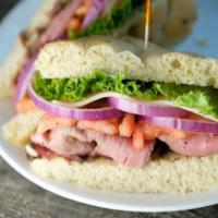 Western Sandwich · Roast beef, provolone, lettuce, tomato, red onion, horseradish sauce and mayo.