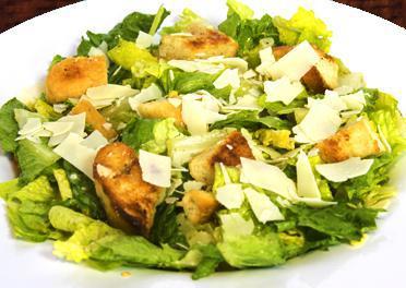 Caesar Salad · Romaine lettuce, Caesar dressing, Parmesan and croutons.