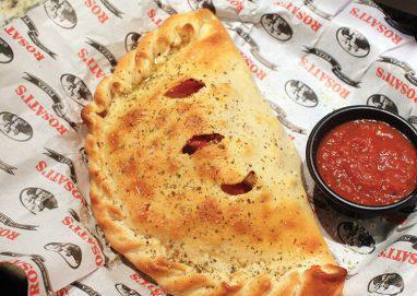 Cheese Calzone · Mozzarella cheese wrapped with butter brushed dough, sprinkled with Parmesan and oregano and then baked to perfection. Served with a side of marinara sauce.