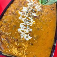 Daal makhni (mix lentil) · Mix lentils cooked and special seasoning and butter / fresh cream sauce served with rice 