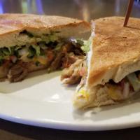 Tortas · Comes with cheese, beans, guacamole, lettuce, pico de gallo and side of french fries. Your c...