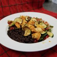 Grilled Shrimp Bowl · Grilled shrimp on top of grilled veggies, black beans and pico de gallo.