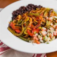 Veggie Fajita Bowl · Grilled veggies, black beans, pico de gallo and guacamole on top of fresh romaine lettuce.
