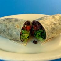 Super Lite Burrito · Black beans, pico de gallo, lettuce and guacamole wrapped in a flour tortilla.