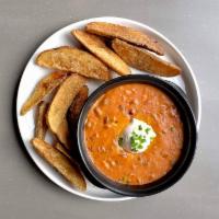 Cheddar Chili Dip · Lentil chili, cheddar cheese, sour cream, scallions; served with potato wedges. Gluten Free....