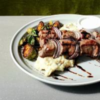 Steak Skewers · Steak, brussels sprouts, red onions, mashed potatoes, and apricot balsamic. Steak comes medi...
