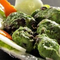 4. Reshmi Kabob · Herbs and spices marinated breast of pieces of chicken grilled in tandoor.