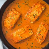 Salmon curry · cooked with sauteed onion,spices and coconut milk