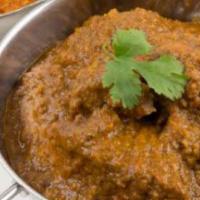 62. Daalcha · Cooked with yellow lentils, variety of spices and flavored with tamarind.