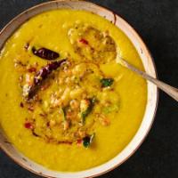 78. Daal Tarka · Yellow lentils cooked with tomato, cumin, cinamon and ginger.