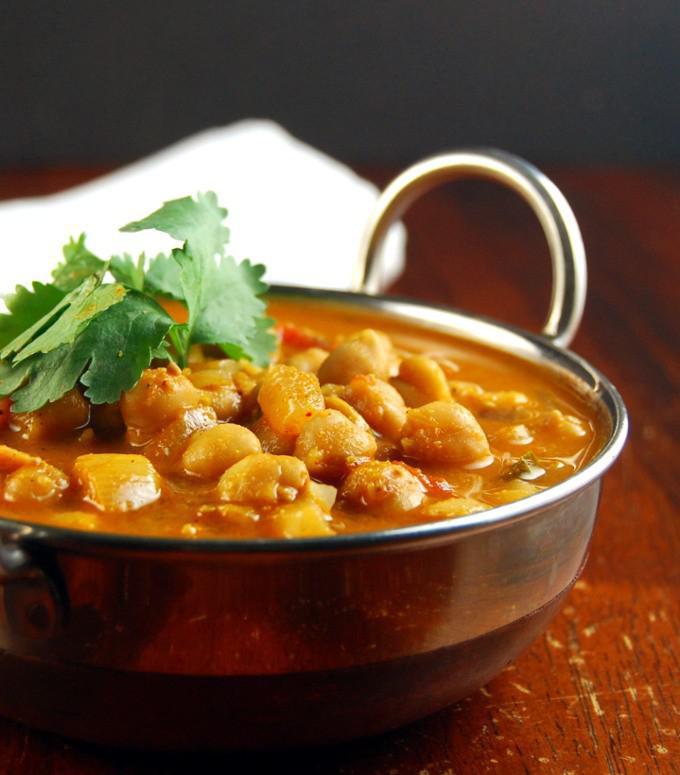 90. Chana Masala · Chickpeas cooked in a chef special masala curry sauce.