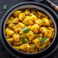 92. Aloo Jeera · Potatoes cooked with cumin and spices.