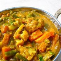 94. Mix Vegetables Curry · Mix vegetables cooked with curry sauce.