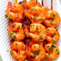 40. Shrimp Tandoori · Shrimp marinated and grill in tandoor oven.
