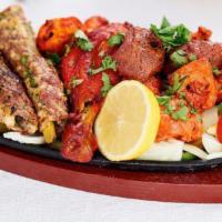 41. Mix Grill · A platter of grill malai kabab, chicken tikka, fish and boti kabab.