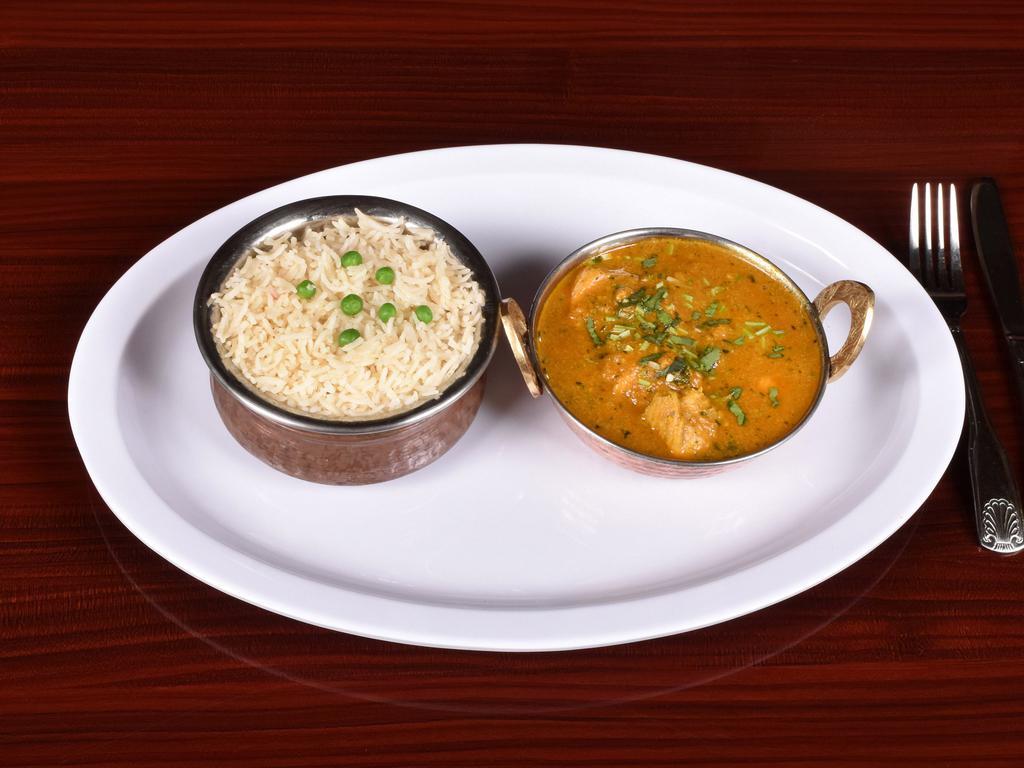 44. Chicken Curry · Chicken cooked in an authentic onion and tomato based curry sauce.