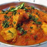 49. Chicken Vindaloo Curry · Cooked with fiery red chilies, spices, potato and a touch of vinegar. Order as you dare! Spi...