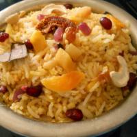 114. Kashmiri Pulao · Saffron rice cooked with coconut and fruits.