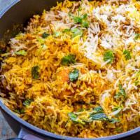 115. Chicken Biryani · Basmati rice cooked with chicken and a variety of herbs and biryani masala.