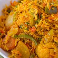 119. Vegetable Biryani · Basmati rice cooked with assorted vegetables and a variety of herbs and biryani masala.