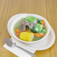 Caldo de Res · A Mexican beef soup typically served with cabbage, potatoes, corn and cilantro