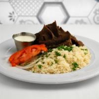Gyro Plate · Plates include rice or fries, soup or salad, and bread. Gyro meat, onions, tomatoes, and cuc...