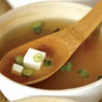 Miso Soup · A delicious blend of miso, green onion and tofu.