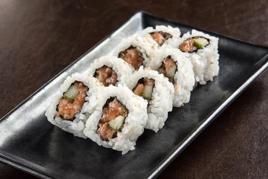 Spicy Salmon Roll · Salmon mixed with spicy mayo combined with cucumber, rolled in seaweed and rice