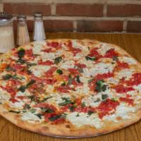 Margarita Pizza · A thin hand-tossed crust is topped with a fresh homemade Pomodoro sauce. The fresh mozzarell...