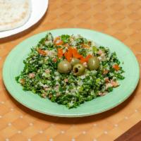 Tabouli Salad · Cracked wheat, parsley, tomato and lemon.