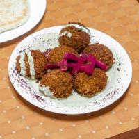 Falafel · Vegetarian patty. Chickpeas, vegetables and spices.