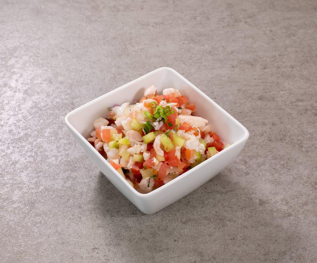 Shrimp Ceviche · Small pieces of fresh shrimp cooked in lime juice with diced tomato, onions and cilantro, topped with fresh avocado. 