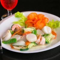 S12. Sauteed Triple Delight · Shrimp, scallop and crabmeat with snow peas, Napa, water chestnut, mushroom, carrot, zucchin...