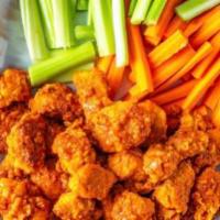 Boneless Wings · Served with sauce & celery