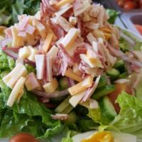 Chef  · Garden salad with ham, turkey, salami, Swiss cheese, American cheese and hard boiled egg.