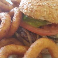 Hamburger  Deluxe · Lettuce, tomato and mayo 

Served with French fries or Onion Rings