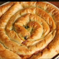 Spanakopita  · Phyllo dough filled with spinach feta and herbs