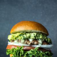 Hands Up Burger (Turkey) · Turkey, feta cheese, guacamole, raw onion, tomatoes, mix green and cilantro aioli. On a fres...