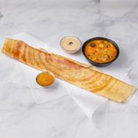 Plain Dosa  · Thin crepe made of rice and lentils, served with chutneys and sambar.