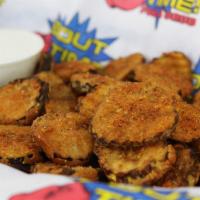 Fried Pickles · Our sliced pickles, lightly breaded and deep fried. Served with jalapeño dip.