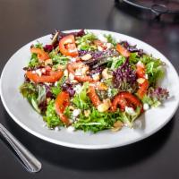 Wild Greens Salad · Wild greens, tomato, Gorgonzola, cashew, raspberry vinaigrette.
